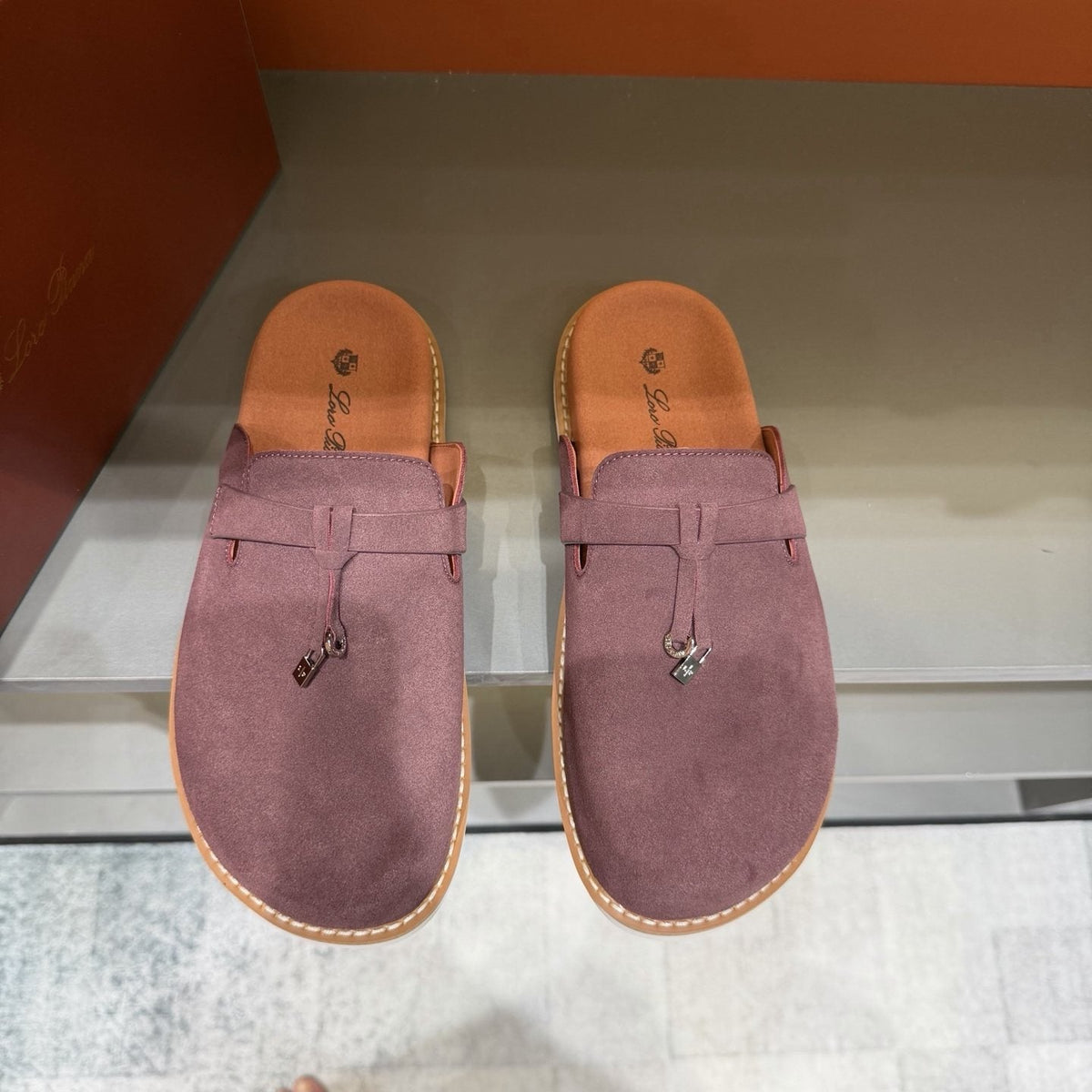 Backless Loafer Mules with Metal Ornament