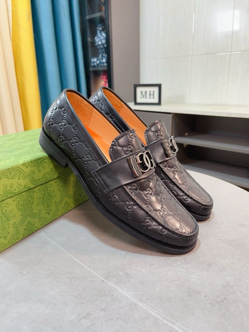 Gucci Embossed Metal-Hardware Loafers